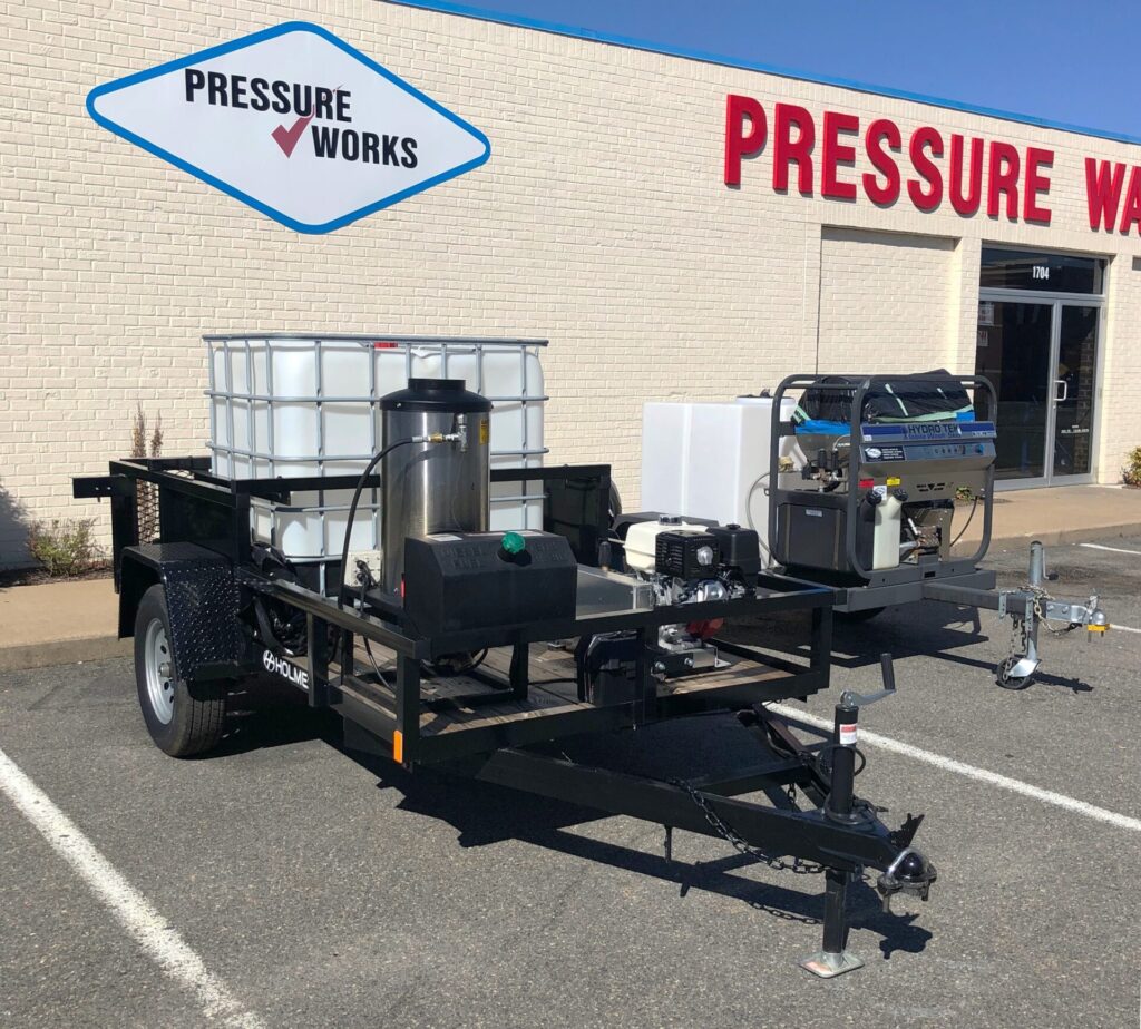 Pressure washing hot water trailer outside Pressure Works Inc.